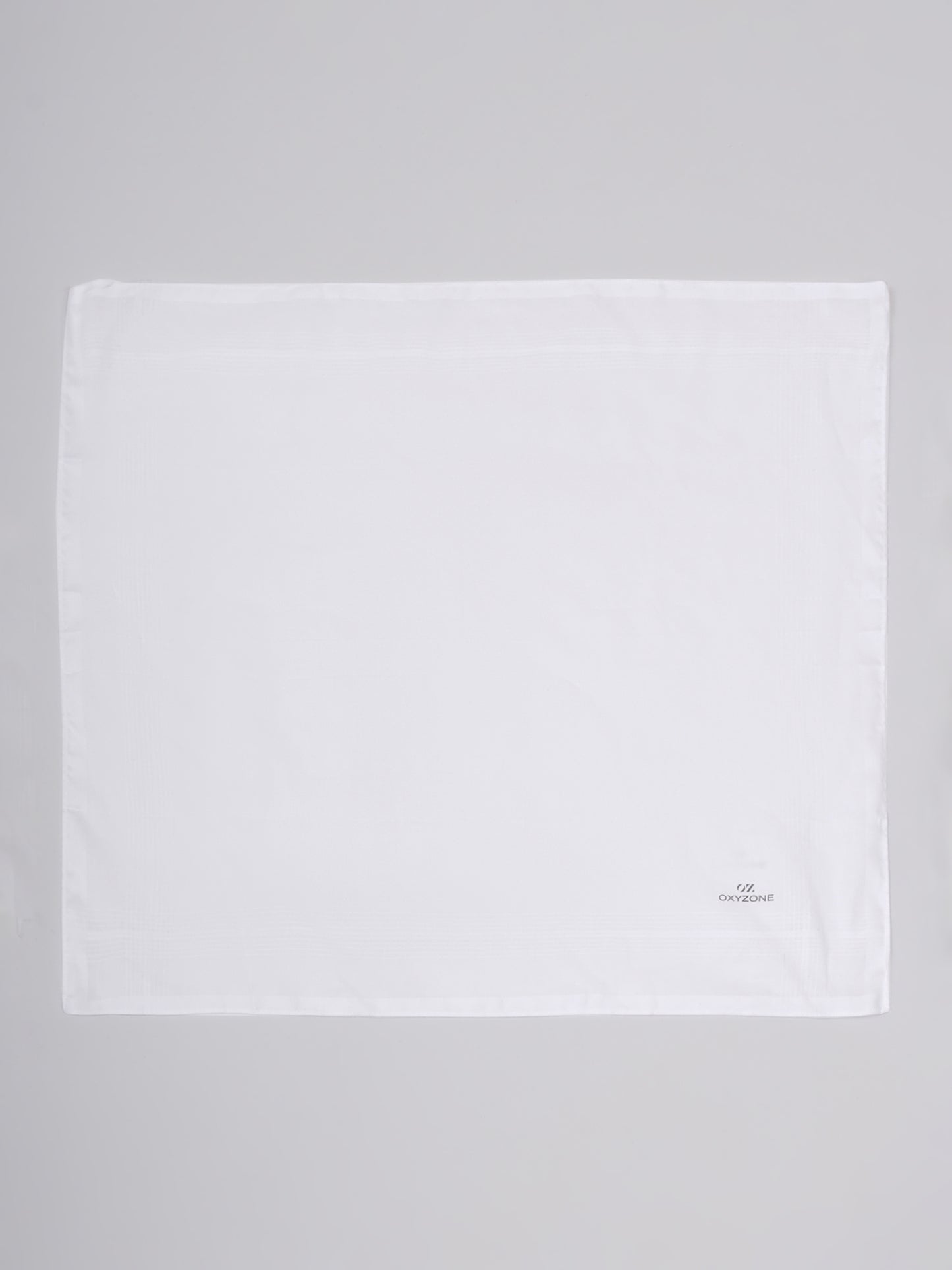 100% COMBED COTTON HANDKERCHIEF IN SOLID WHITE COLOR.